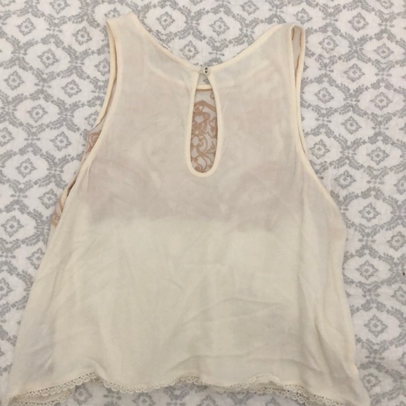 Off-white crop shirt with a rose gold design. - Picture 2 of 3